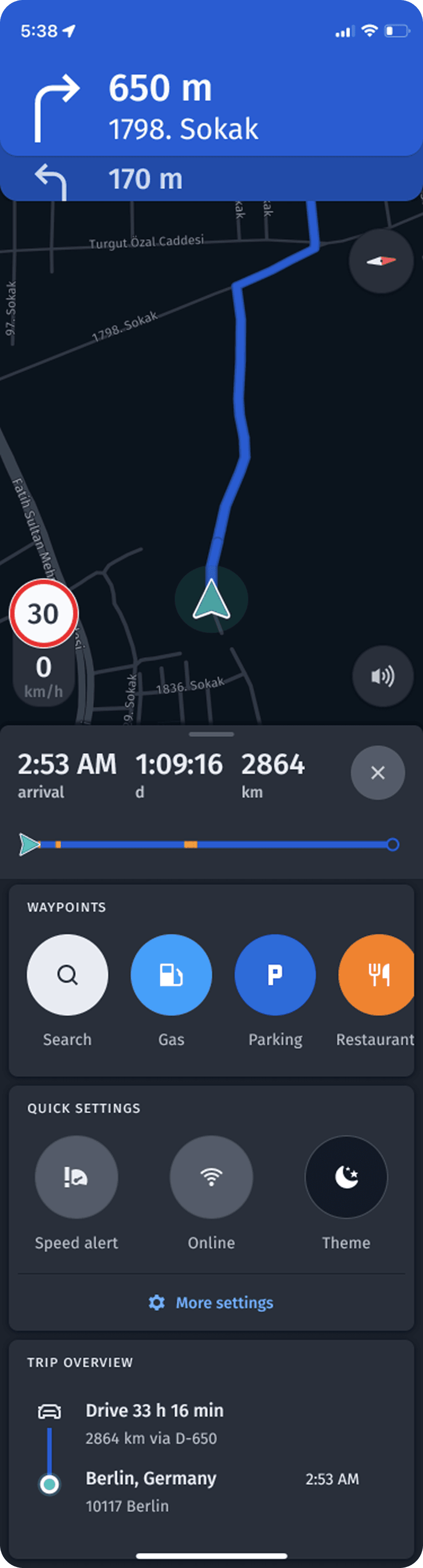 Mobile navigation: the blue direction panel showing 650 m to the next turn, the speed limit and current speed over the map, and the trip panel below with Waypoints, Quick Settings and Trip overview inside the navigation window.